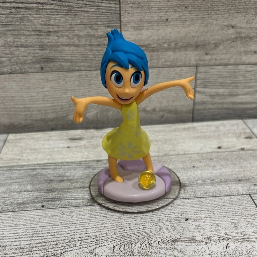 Disney Joy Figurine - Blue and Yellow